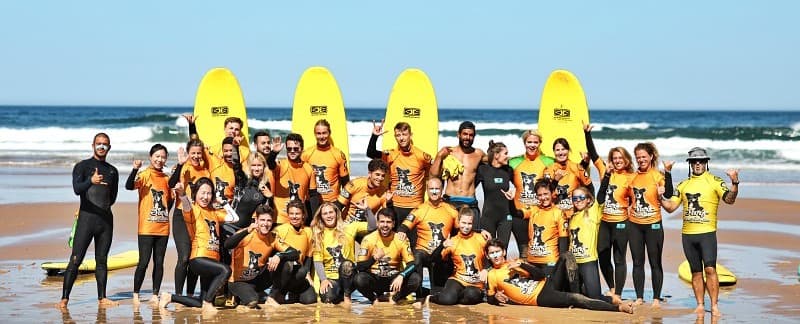 Group surf lesson on the beach in Lagos